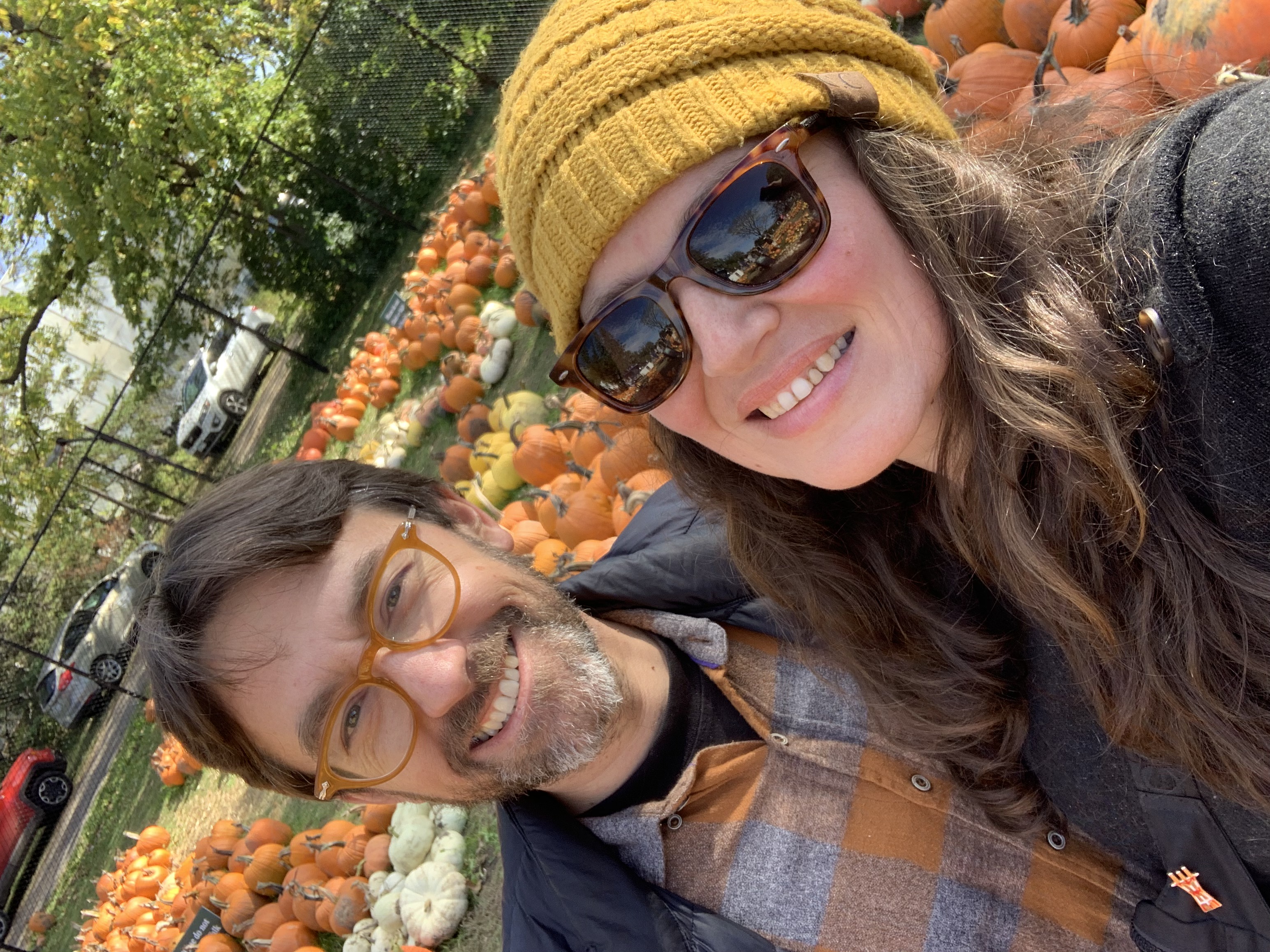Meg and Kevin picking out pumpkins at the MN Arboretum